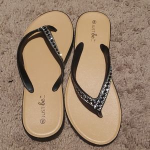 Tan and black sandals
